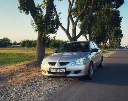 Сірий Міцубісі Lancer, об'ємом двигуна 1.58 л та пробігом 270 тис. км за 1999 $, фото 8 на Automoto.ua