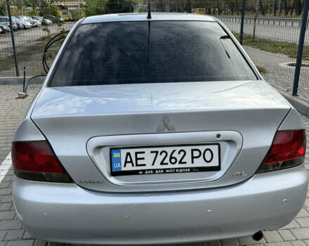 Серый Мицубиси Лансер, объемом двигателя 1.29 л и пробегом 263 тыс. км за 3400 $, фото 3 на Automoto.ua