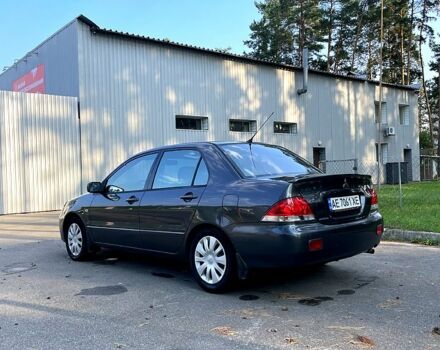 Серый Мицубиси Лансер, объемом двигателя 1.6 л и пробегом 281 тыс. км за 4700 $, фото 1 на Automoto.ua