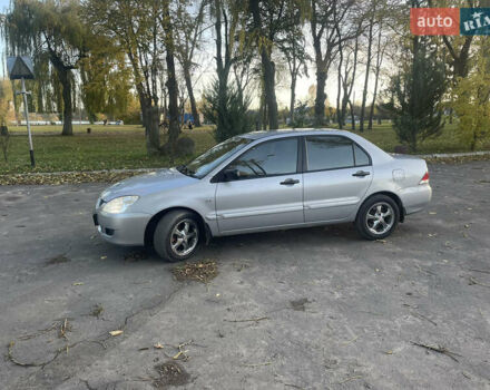 Сірий Міцубісі Lancer, об'ємом двигуна 1.58 л та пробігом 271 тис. км за 3000 $, фото 9 на Automoto.ua