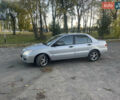Сірий Міцубісі Lancer, об'ємом двигуна 1.58 л та пробігом 271 тис. км за 3000 $, фото 9 на Automoto.ua
