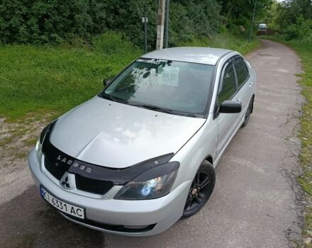 Сірий Міцубісі Lancer, об'ємом двигуна 2 л та пробігом 240 тис. км за 3500 $, фото 7 на Automoto.ua