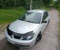 Сірий Міцубісі Lancer, об'ємом двигуна 2 л та пробігом 240 тис. км за 3500 $, фото 7 на Automoto.ua