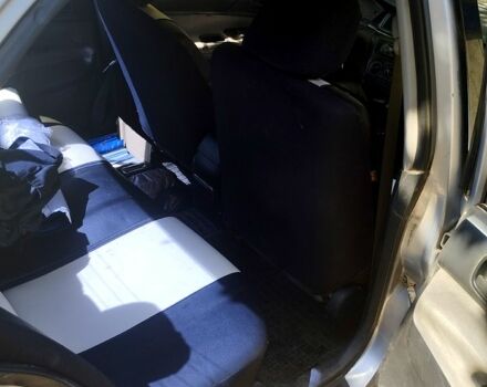 Серый Мицубиси Лансер, объемом двигателя 1.6 л и пробегом 308 тыс. км за 3500 $, фото 5 на Automoto.ua