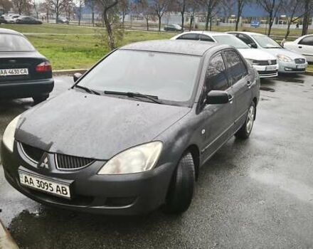 Сірий Міцубісі Lancer, об'ємом двигуна 1.58 л та пробігом 110 тис. км за 2999 $, фото 2 на Automoto.ua