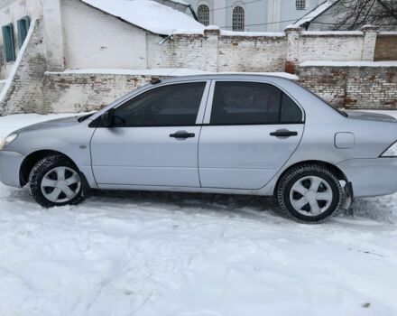 Сірий Міцубісі Lancer, об'ємом двигуна 0.13 л та пробігом 190 тис. км за 4250 $, фото 4 на Automoto.ua