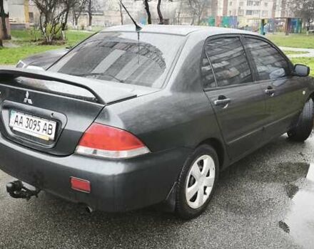 Сірий Міцубісі Lancer, об'ємом двигуна 1.58 л та пробігом 110 тис. км за 2999 $, фото 7 на Automoto.ua