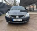 Серый Мицубиси Лансер, объемом двигателя 1.6 л и пробегом 280 тыс. км за 3700 $, фото 1 на Automoto.ua