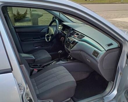 Серый Мицубиси Лансер, объемом двигателя 1.3 л и пробегом 230 тыс. км за 3900 $, фото 2 на Automoto.ua