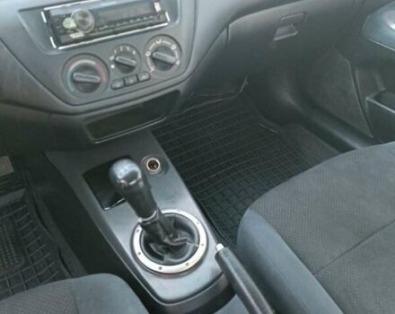 Мицубиси Лансер 2004 в Нежине на Automoto.ua Серый Мицубиси Лансер, объемом двигателя 2 л и пробегом 280 тыс. км за 6000 $, фото 1 на Automoto.ua