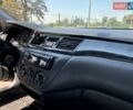 Серый Мицубиси Лансер, объемом двигателя 1.58 л и пробегом 167 тыс. км за 5100 $, фото 37 на Automoto.ua