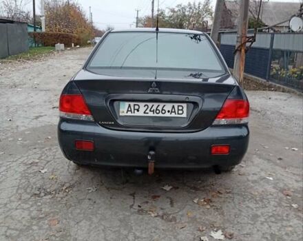 Серый Мицубиси Лансер, объемом двигателя 1.6 л и пробегом 372 тыс. км за 3500 $, фото 1 на Automoto.ua