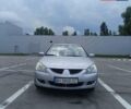 Сірий Міцубісі Lancer, об'ємом двигуна 1.6 л та пробігом 242 тис. км за 4300 $, фото 1 на Automoto.ua