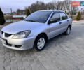 Сірий Міцубісі Lancer, об'ємом двигуна 1.3 л та пробігом 450 тис. км за 2850 $, фото 1 на Automoto.ua
