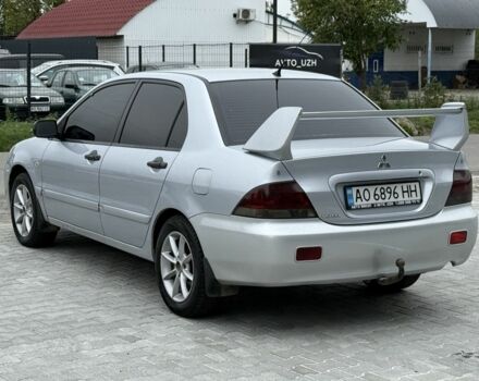 Серый Мицубиси Лансер, объемом двигателя 1.6 л и пробегом 360 тыс. км за 2400 $, фото 3 на Automoto.ua