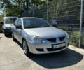 Сірий Міцубісі Lancer, об'ємом двигуна 1.58 л та пробігом 210 тис. км за 3900 $, фото 2 на Automoto.ua