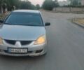 Сірий Міцубісі Lancer, об'ємом двигуна 1.6 л та пробігом 2 тис. км за 1661 $, фото 1 на Automoto.ua
