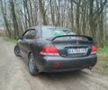 Сірий Міцубісі Lancer, об'ємом двигуна 1.58 л та пробігом 360 тис. км за 4000 $, фото 5 на Automoto.ua