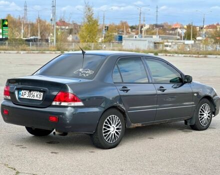 Серый Мицубиси Лансер, объемом двигателя 1.6 л и пробегом 490 тыс. км за 1799 $, фото 6 на Automoto.ua