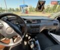 Серый Мицубиси Лансер, объемом двигателя 1.58 л и пробегом 167 тыс. км за 5100 $, фото 29 на Automoto.ua