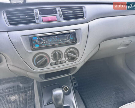 Сірий Міцубісі Lancer, об'ємом двигуна 1.3 л та пробігом 450 тис. км за 2850 $, фото 14 на Automoto.ua