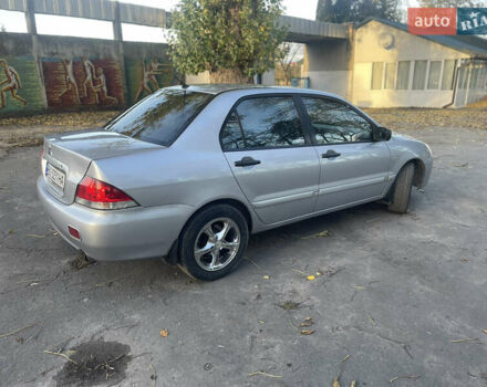 Мицубиси Лансер 2004 в Теофиполь на Automoto.ua Серый Мицубиси Лансер, объемом двигателя 1.58 л и пробегом 270 тыс. км за 3350 $, фото 4 на Automoto.ua