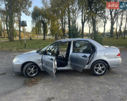 Мицубиси Лансер 2004 в Теофиполь на Automoto.ua Серый Мицубиси Лансер, объемом двигателя 1.58 л и пробегом 270 тыс. км за 3350 $, фото 13 на Automoto.ua