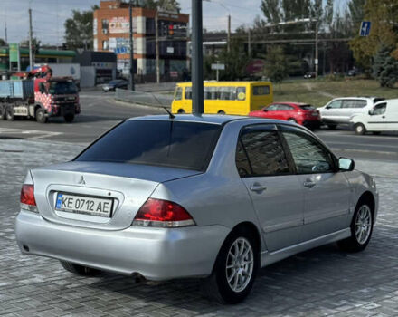 Сірий Міцубісі Lancer, об'ємом двигуна 1.6 л та пробігом 260 тис. км за 3899 $, фото 4 на Automoto.ua