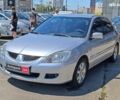 Серый Мицубиси Лансер, объемом двигателя 1.6 л и пробегом 284 тыс. км за 4990 $, фото 1 на Automoto.ua