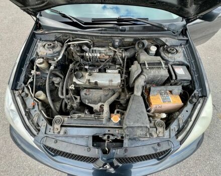 Серый Мицубиси Лансер, объемом двигателя 1.6 л и пробегом 490 тыс. км за 1799 $, фото 19 на Automoto.ua