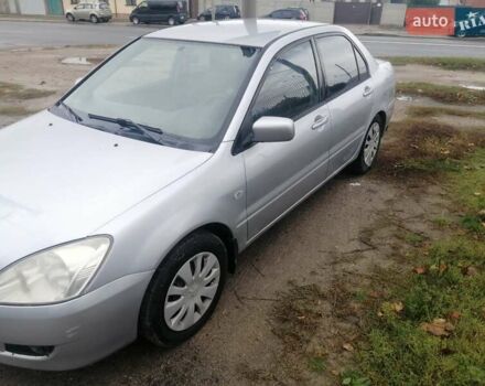 Міцубісі Lancer 2004 у Харкові на Automoto.ua Сірий Міцубісі Lancer, об'ємом двигуна 1.58 л та пробігом 248 тис. км за 3550 $, фото 10 на Automoto.ua