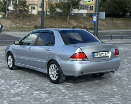 Сірий Міцубісі Lancer, об'ємом двигуна 1.6 л та пробігом 260 тис. км за 3899 $, фото 2 на Automoto.ua