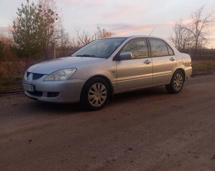Сірий Міцубісі Lancer, об'ємом двигуна 1.6 л та пробігом 280 тис. км за 3800 $, фото 2 на Automoto.ua