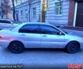 Сірий Міцубісі Lancer, об'ємом двигуна 1.6 л та пробігом 380 тис. км за 4600 $, фото 11 на Automoto.ua