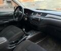 Серый Мицубиси Лансер, объемом двигателя 2 л и пробегом 180 тыс. км за 3700 $, фото 7 на Automoto.ua