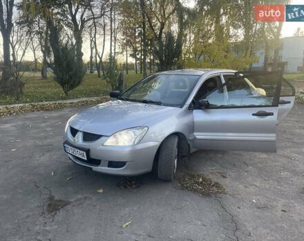 Сірий Міцубісі Lancer, об'ємом двигуна 1.58 л та пробігом 271 тис. км за 3000 $, фото 12 на Automoto.ua