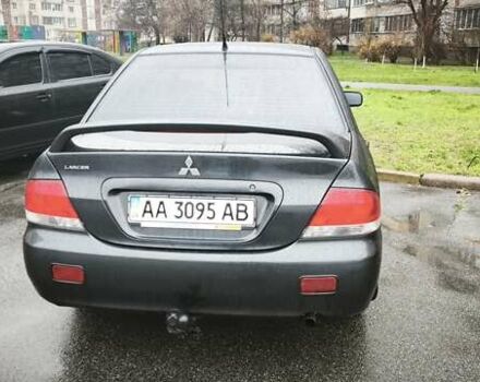 Сірий Міцубісі Lancer, об'ємом двигуна 1.58 л та пробігом 110 тис. км за 2999 $, фото 11 на Automoto.ua