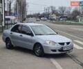 Серый Мицубиси Лансер, объемом двигателя 1.29 л и пробегом 259 тыс. км за 2999 $, фото 4 на Automoto.ua