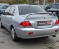 Сірий Міцубісі Lancer, об'ємом двигуна 1.6 л та пробігом 284 тис. км за 4280 $, фото 10 на Automoto.ua