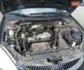 Сірий Міцубісі Lancer, об'ємом двигуна 1.58 л та пробігом 531 тис. км за 2828 $, фото 11 на Automoto.ua