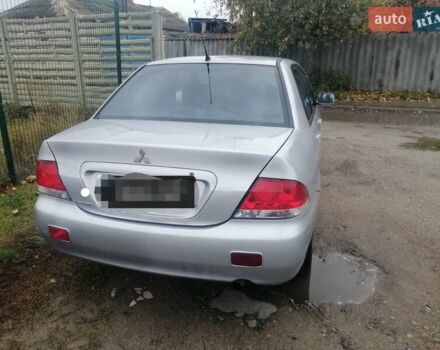 Міцубісі Lancer 2004 у Харкові на Automoto.ua Сірий Міцубісі Lancer, об'ємом двигуна 1.58 л та пробігом 248 тис. км за 3550 $, фото 5 на Automoto.ua