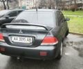 Сірий Міцубісі Lancer, об'ємом двигуна 1.58 л та пробігом 110 тис. км за 2999 $, фото 8 на Automoto.ua