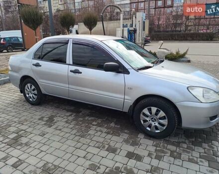 Серый Мицубиси Лансер, объемом двигателя 1.3 л и пробегом 230 тыс. км за 3900 $, фото 4 на Automoto.ua