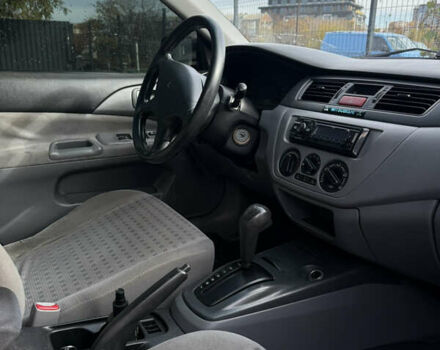 Серый Мицубиси Лансер, объемом двигателя 1.29 л и пробегом 263 тыс. км за 3400 $, фото 8 на Automoto.ua