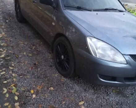 Мицубиси Лансер 2004 в Черкассах на Automoto.ua Серый Мицубиси Лансер, объемом двигателя 1.6 л и пробегом 313 тыс. км за 4800 $, фото 6 на Automoto.ua