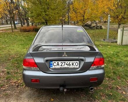 Серый Мицубиси Лансер, объемом двигателя 1.58 л и пробегом 313 тыс. км за 4650 $, фото 7 на Automoto.ua