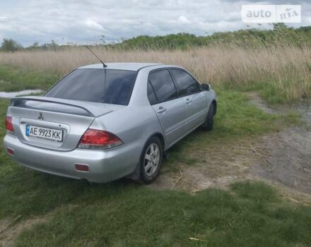 Сірий Міцубісі Lancer, об'ємом двигуна 1.6 л та пробігом 200 тис. км за 4500 $, фото 12 на Automoto.ua