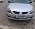Сірий Міцубісі Lancer, об'ємом двигуна 1 л та пробігом 289 тис. км за 3500 $, фото 1 на Automoto.ua