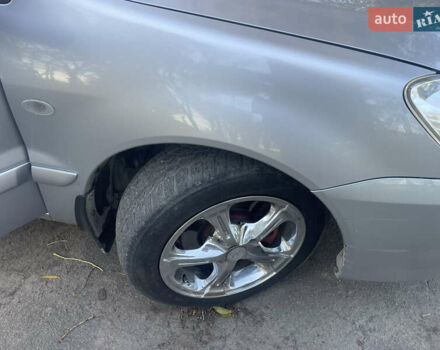 Сірий Міцубісі Lancer, об'ємом двигуна 1.58 л та пробігом 271 тис. км за 3000 $, фото 16 на Automoto.ua