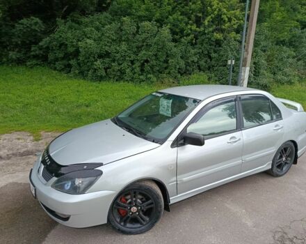Сірий Міцубісі Lancer, об'ємом двигуна 2 л та пробігом 240 тис. км за 3500 $, фото 1 на Automoto.ua
